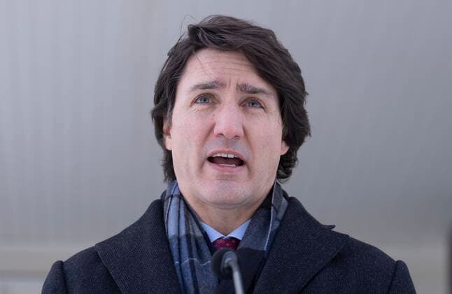 January 31, 2022, National Capital Region, Canada: Canadian Prime Minister Justin Trudeau responds to a reporters question as he participates in a media availability held at a location in the National Capital Region which is not being made public for security reasons, Monday, January 31, 2022. National Capital Region Canada  - ZUMAc35_ 20220131_zaf_c35_032 Copyright: xAdrianxWyldx