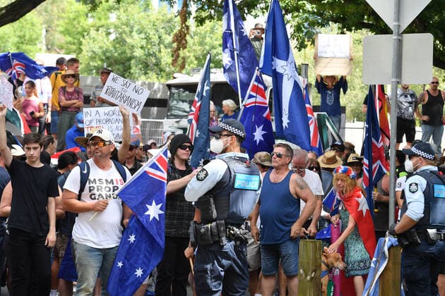 COVID19 VACCINATION PROTEST CANBERRA, Protesters are seen during an anti-vaccination rally outside the National Press Club of Australia where Prime Minister Scott Morrison will speak in Canberra, Tuesday, February 1, 2022. ( NO ARCHIVING, EDITORIAL USE ONLY, NO USE IN BOOKS WITHOUT CONSENT CANBERRA ACT AUSTRALIA  Copyright: xMICKxTSIKASx 20220201001618936174
