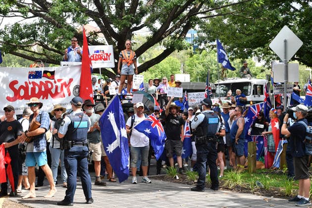 COVID19 VACCINATION PROTEST CANBERRA, Protesters are seen during an anti-vaccination rally outside the National Press Club of Australia where Prime Minister Scott Morrison will speak in Canberra, Tuesday, February 1, 2022. ( NO ARCHIVING, EDITORIAL USE ONLY, NO USE IN BOOKS WITHOUT CONSENT CANBERRA ACT AUSTRALIA  Copyright: xMICKxTSIKASx 20220201001618936248