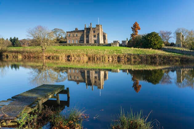 Ripley Caste reflected on the still water of the Lake, Nidderdale, The Yorkshire Dales National Park, Yorkshire, England, United Kingdom, Europe Copyright: JohnxPotter 1228-288 Editorial Use Only