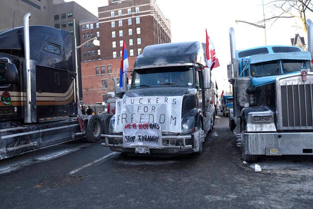 4th Day Of Trucker s Protest At Parliament Hill Trucks lined up with banners and signs next to the Parliament building during the 4th Day of Trucker s protest against the mandatory vaccine policy imposed on the Canadian truckers returning from USA to avoid a two week quarantine at Parliament Hill in Ottawa-Canada Ottawa Canada  Copyright: xArindamxShivaanix originalFilename: shivaanibahuguna-notitle220201_npnle.jpg