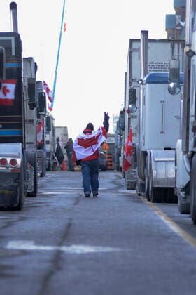 4th Day Of Trucker s Protest At Parliament Hill A supporter showing victory sign during the 4th Day of Trucker s protest against the mandatory vaccine policy imposed on the Canadian truckers returning from USA to avoid a two week quarantine at Parliament Hill in Ottawa-Canada Ottawa Canada  Copyright: xArindamxShivaanix originalFilename: shivaanibahuguna-notitle220201_npCTV.jpg