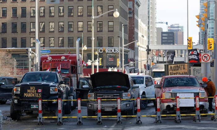 February 1, 2022, Ottawa, ON, CANADA: Trucks are blocked by police barricades as a rally against COVID-19 restrictions, which began as a cross-country convoy protesting a federal vaccine mandate for truckers continues in Ottawa on Tuesday, February 1, 2022. As organizers behind the demonstration that has seized the nation s capital say they are preparing to stick around even longer by distributing fuel and supplies to the trucks clogging up Ottawa streets, politicians at all levels of government are asking them to roll out. Ottawa CANADA  - ZUMAc35_ 20220201_zaf_c35_073 Copyright: xPatrickxDoylex