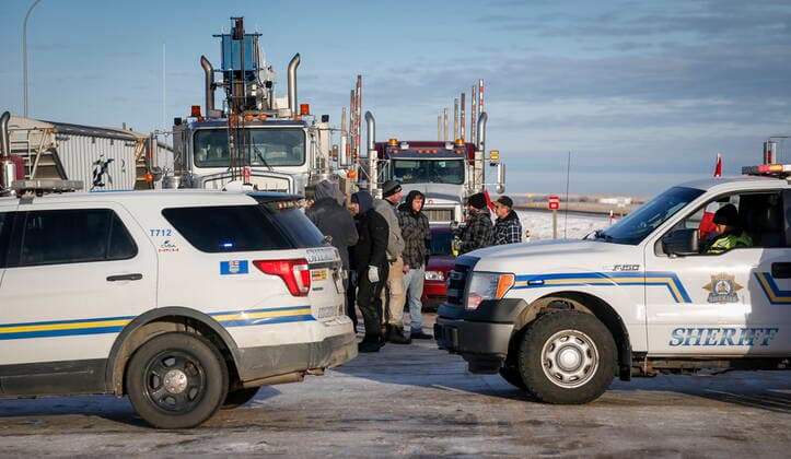 February 3, 2022, Milk River, AB, CANADA: Anti-COVID-19 vaccine mandate demonstrators block the highway in Milk River, Alta., Thursday, Feb. 3, 2022. Milk River CANADA  - ZUMAc35_ 20220203_zaf_c35_068 Copyright: xJeffxMcintoshx