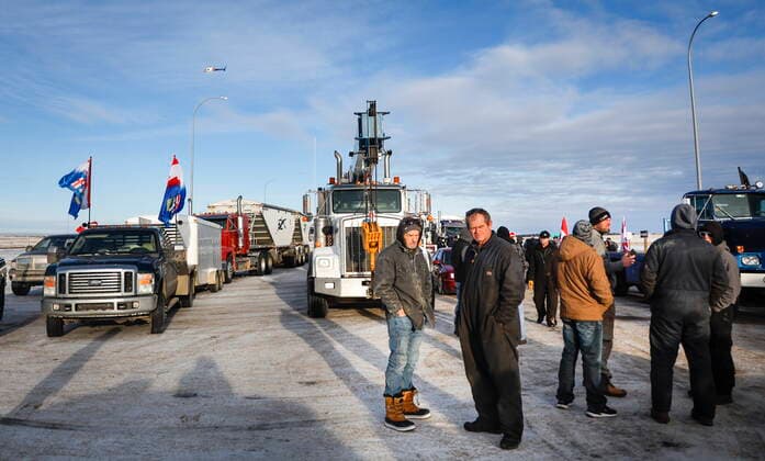 February 3, 2022, Milk River, AB, CANADA: Anti-COVID-19 vaccine mandate demonstrators block the highway in Milk River, Alta., Thursday, Feb. 3, 2022. Milk River CANADA  - ZUMAc35_ 20220203_zaf_c35_072 Copyright: xJeffxMcintoshx