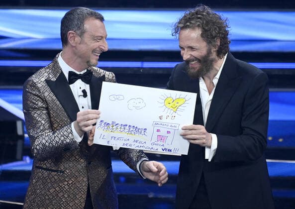 February 5, 2022, SANREMO: Sanremo Festival host and artistic director, Amadeus (L), and Italian singer Jovanotti on stage at the Ariston theatre during the 72nd Sanremo Italian Song Festival, Sanremo, Italy, 04 February 2022. The music festival runs from 01 to 05 February 2022. ANSA RICCARDO ANTIMIANI SANREMO  - ZUMAa110 20220205_zaf_a110_026 Copyright: xRiccardoxAntimianix