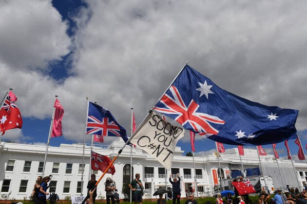 COVID19 VACCINATION PROTEST CANBERRA, Protesters with flags are seen during an anti-vaccination rally outside Old Parliament House in Canberra, Saturday, February 5, 2022. ( NO ARCHIVING, EDITORIAL USE ONLY, NO USE IN BOOKS WITHOUT CONSENT CANBERRA ACT AUSTRALIA  Copyright: xMICKxTSIKASx 20220205001620077938