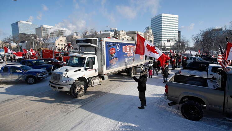 February 4, 2022, WINNIPEG, MANITOBA, CANADA: People rally against provincial and federal COVID-19 vaccine mandates and in support of Ottawa protestors outside the Manitoba Legislature in Winnipeg, Friday, February 4, 2022. WINNIPEG CANADA  - ZUMAc35_ 20220204_zaf_c35_110 Copyright: xJohnxWoodsx