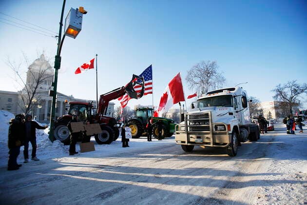 February 4, 2022, WINNIPEG, MANITOBA, CANADA: People rally against provincial and federal COVID-19 vaccine mandates and in support of Ottawa protestors outside the Manitoba Legislature in Winnipeg, Friday, February 4, 2022. WINNIPEG CANADA  - ZUMAc35_ 20220204_zaf_c35_180 Copyright: xJohnxWoodsx