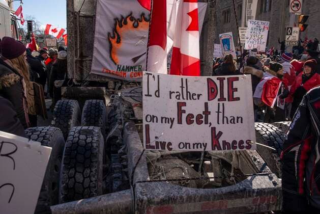 February 5, 2022, Toronto, Ontario, Canada: Protesters gather on the streets on Toronto in opposition of COVID-19 measures and vaccine mandates imposed by the Justin Trudeau government. Organized by the Ã¢â‚¬oeFreedom ConvoyÃ¢â‚¬Â, the demonstration began with a cross-country trek opposing the federal governmentÃ¢â‚¬â ¢s vaccine mandate for cross-border truckers. Toronto Canada - ZUMAc232 20220205_zip_c232_008 Copyright: xGilesxCampbellx