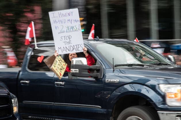 February 5, 2022, Vancouver, British Columbia, Canada: Protesters against COVID-19 safety mandates take to the streets of downtown Vancouver Feb. 5. A convoy of hundreds of vehicles travelled from several nearby municipalities to show their support for the so-called Freedom Convoy of truckers, who brought their protest of mandated vaccines for travel to and from the United States to the nationÃ¢â‚¬â ¢s capital, Ottawa, Ontario, bringing parts of the city to a stand still for the past five days. Vancouver Canada - ZUMAb217 20220205_zip_b217_003 Copyright: xQuinnxBenderx