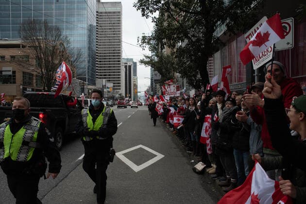 February 5, 2022, Vancouver, British Columbia, Canada: Protectors against COVID-19 safety mandates take to the streets of downtown Vancouver Feb. 5. A convoy of hundreds of vehicles travelled from several nearby municipalities to show their support for the so-called Freedom Convoy of truckers, who brought their protest of mandated vaccines for travel to and from the United States to the nationÃ¢â‚¬â ¢s capital, Ottawa, Ontario, bringing parts of the city to a stand still for the past five days. Vancouver Canada - ZUMAb217 20220205_zip_b217_007 Copyright: xQuinnxBenderx