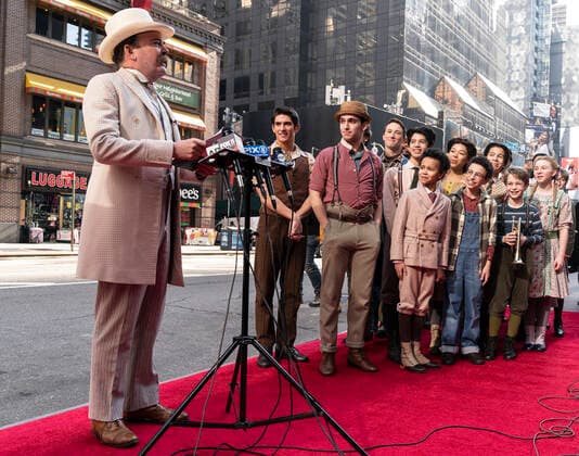 NY: The Music Man cast presser with Jefferson Mays Jefferson Mays who plays Mayor George Shinn in new production of The Music Man speaks at the presser in front of Winter Garden Theatre. Jefferson Mays, joined by young cast members and Barbershop Quartet in costumes, addressed the media in advance of opening outside of the theater. Barbershop Quartet serenades in front of the media and young actors show their skills. New York New York United States Copyright: LevxRadin