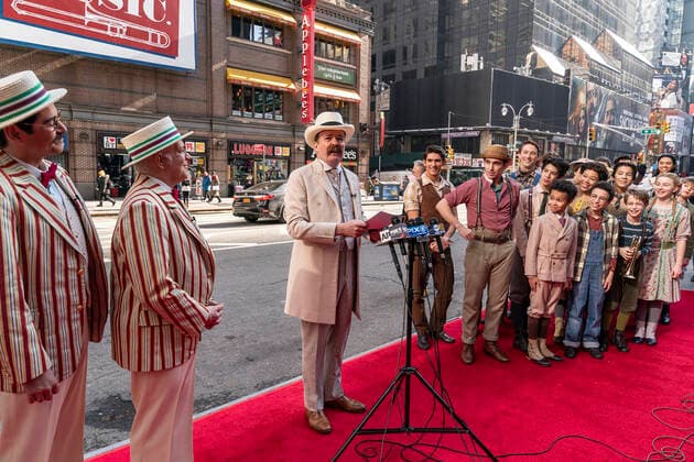 NY: The Music Man cast presser with Jefferson Mays Jefferson Mays who plays Mayor George Shinn in new production of The Music Man speaks at the presser in front of Winter Garden Theatre. Jefferson Mays, joined by young cast members and Barbershop Quartet in costumes, addressed the media in advance of opening outside of the theater. Barbershop Quartet serenades in front of the media and young actors show their skills. New York New York United States Copyright: LevxRadin