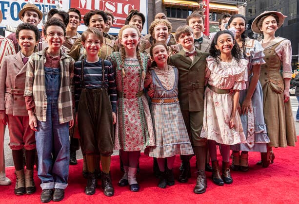 NY: The Music Man cast presser with Jefferson Mays Young cast members of The Music Man pose at the presser in front of Winter Garden Theatre. Jefferson Mays, joined by young cast members and Barbershop Quartet in costumes, addressed the media in advance of opening outside of the theater. Barbershop Quartet serenades in front of the media and young actors show their skills. New York New York United States Copyright: LevxRadin