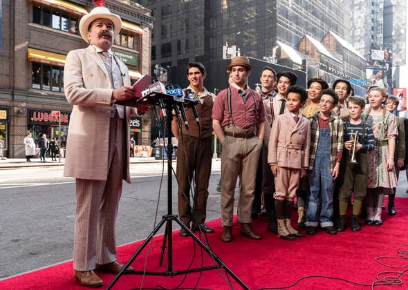 NY: The Music Man cast presser with Jefferson Mays Jefferson Mays who plays Mayor George Shinn in new production of The Music Man speaks at the presser in front of Winter Garden Theatre. Jefferson Mays, joined by young cast members and Barbershop Quartet in costumes, addressed the media in advance of opening outside of the theater. Barbershop Quartet serenades in front of the media and young actors show their skills. New York New York United States Copyright: LevxRadin