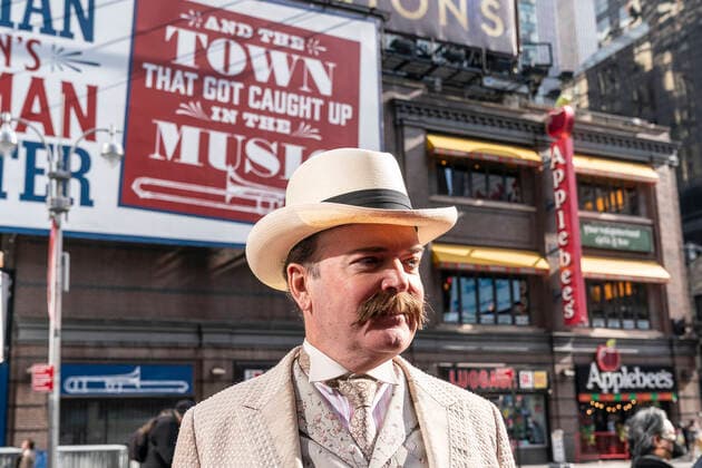 NY: The Music Man cast presser with Jefferson Mays Jefferson Mays who plays Mayor George Shinn in new production of The Music Man poses after the presser in front of Winter Garden Theatre. Jefferson Mays, joined by young cast members and Barbershop Quartet in costumes, addressed the media in advance of opening outside of the theater. Barbershop Quartet serenades in front of the media and young actors show their skills. New York New York United States Copyright: LevxRadin