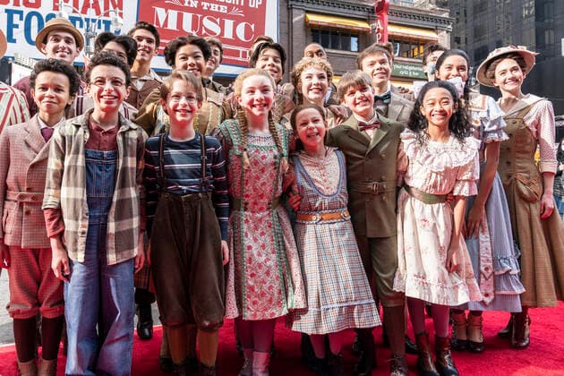 NY: The Music Man cast presser with Jefferson Mays Young cast members of The Music Man pose at the presser in front of Winter Garden Theatre. Jefferson Mays, joined by young cast members and Barbershop Quartet in costumes, addressed the media in advance of opening outside of the theater. Barbershop Quartet serenades in front of the media and young actors show their skills. New York New York United States Copyright: LevxRadin