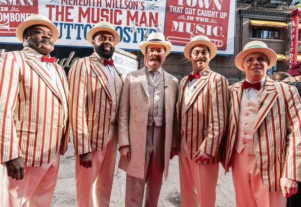 NY: The Music Man cast presser with Jefferson Mays Jefferson Mays who plays Mayor George Shinn and Barbershop Quartet of The Music Man pose after the presser in front of Winter Garden Theatre. Jefferson Mays, joined by young cast members and Barbershop Quartet in costumes, addressed the media in advance of opening outside of the theater. Barbershop Quartet serenades in front of the media and young actors show their skills. New York New York United States Copyright: LevxRadin