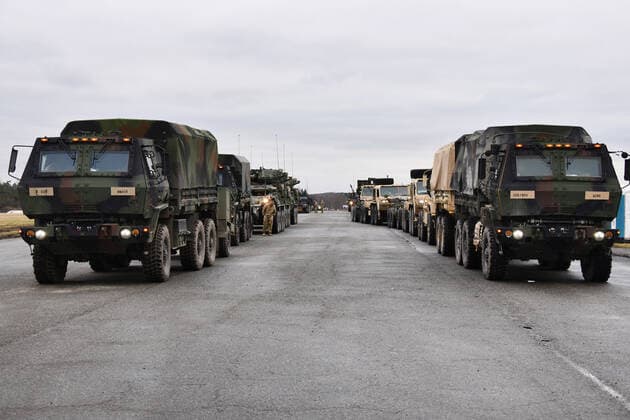 Various tactical vehicles assigned to the 2nd Squadron, 2nd Cavalry Regiment await to be loaded onto trucks at the 7th Army Training Command s Rose Barracks Air Field, Vilseck, Germany, on February 9, 2022. The Squadron will deploy to Romania in the coming days to augment the more than 900 U.S. service members already in Romania. This move is designed to respond to the current security environment and to reinforce the deterrent and defensive posture on NATO s eastern flank.  WAX2022020908 GertrudxZach