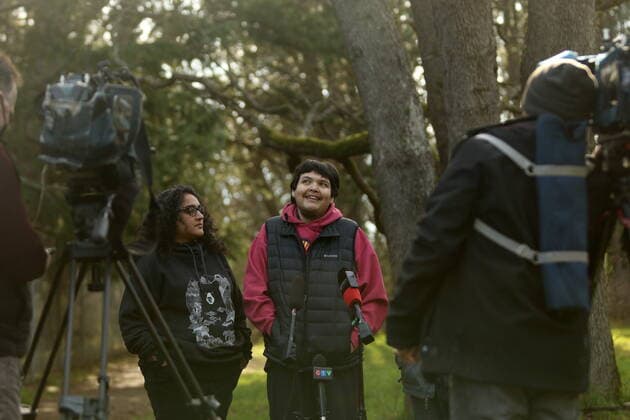 February 11, 2022, VICTORIA, BC, CANADA: Bear Henry is joined by friends Nakita Sekhon, left, and Shae Perkins during a press conference at Beacon Hill Park in Victoria, Friday, Feb. 11, 2022. Henry went missing for 74 days while participating in the old-growth logging protests in Fairy Creek in the Cowichan Valley area near Port Renfrew. Henry was found by loggers in the area before returning home safely. VICTORIA CANADA  - ZUMAc35_ 20220211_zaf_c35_188 Copyright: xChadxHipolitox