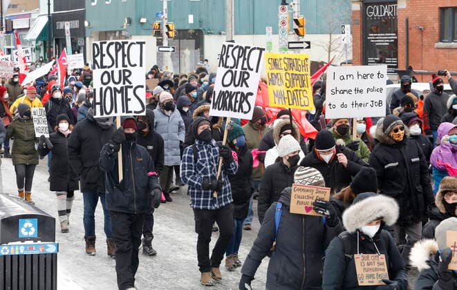 February 12, 2022, Ottawa, ON, CANADA: Counter-protestors gather in support of vaccines and mandates as a larger group of people against COVID-19 measures has grown into a broader anti-government protest in Ottawa on Saturday, February 12, 2022. Ottawa CANADA  - ZUMAc35_ 20220212_zaf_c35_248 Copyright: xPatrickxDoylex