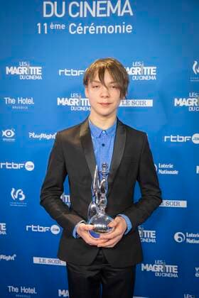 Actor Günter Duret poses with the trophy after winning the Magritte for best promising male actor at the Magritte du Cinema film awards ceremony, Saturday 12 February 2022, in Brussels. The prizes are awarded to movies of Belgian French-speaking producers.  PAUL-HENRIxVERLOOY 9315515