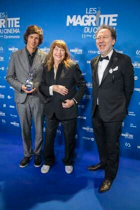 Jan Ackermans, son of director Marion Hänsel, Jane Birkin and Charly Herscovici, president of the Magritte foundation pose after -the Magritte of honour was awarded to director Marion Hänsel at the Magritte du Cinema film awards ceremony, Saturday 12 February 2022, in Brussels. The prizes are awarded to movies of Belgian French-speaking producers.  PAUL-HENRIxVERLOOY 9321732