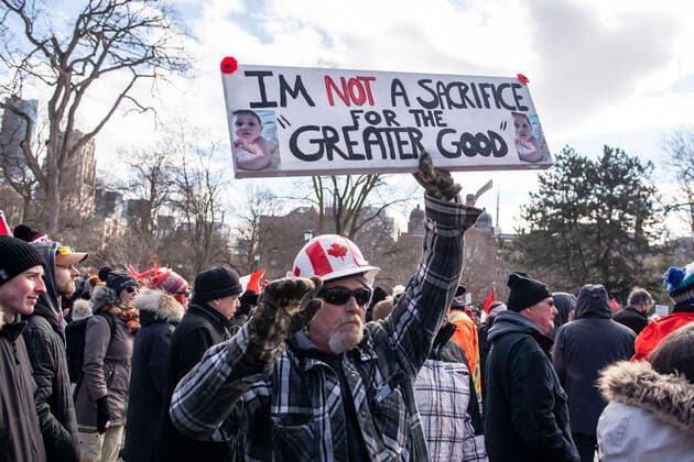 February 12, 2022, Toronto, Ontario, Canada: Protesters gather in QueenÃ¢â‚¬â ¢s Park in Toronto for a second week in opposition of COVID-19 measures and vaccine mandates imposed by the Justin Trudeau government. Organized by the Ã¢â‚¬oeFreedom ConvoyÃ¢â‚¬Â, the demonstration began with a cross-country trek opposing the federal governmentÃ¢â‚¬â ¢s vaccine mandate for cross-border truckers. Toronto Canada - ZUMAc232 20220212_zip_c232_001 Copyright: xGilesxCampbellx
