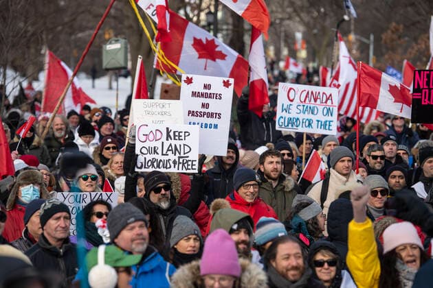 February 12, 2022, Toronto, Ontario, Canada: Protesters gather in QueenÃ¢â‚¬â ¢s Park in Toronto for a second week in opposition of COVID-19 measures and vaccine mandates imposed by the Justin Trudeau government. Organized by the Ã¢â‚¬oeFreedom ConvoyÃ¢â‚¬Â, the demonstration began with a cross-country trek opposing the federal governmentÃ¢â‚¬â ¢s vaccine mandate for cross-border truckers. Toronto Canada - ZUMAc232 20220212_zip_c232_003 Copyright: xGilesxCampbellx