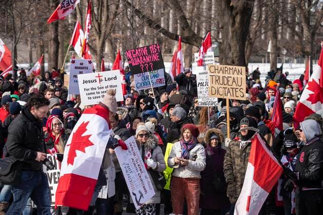 February 12, 2022, Toronto, Ontario, Canada: Protesters gather in QueenÃ¢â‚¬â ¢s Park in Toronto for a second week in opposition of COVID-19 measures and vaccine mandates imposed by the Justin Trudeau government. Organized by the Ã¢â‚¬oeFreedom ConvoyÃ¢â‚¬Â, the demonstration began with a cross-country trek opposing the federal governmentÃ¢â‚¬â ¢s vaccine mandate for cross-border truckers. Toronto Canada - ZUMAc232 20220212_zip_c232_004 Copyright: xGilesxCampbellx
