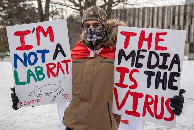 February 12, 2022, Toronto, Ontario, Canada: Protesters gather in QueenÃ¢â‚¬â ¢s Park in Toronto for a second week in opposition of COVID-19 measures and vaccine mandates imposed by the Justin Trudeau government. Organized by the Ã¢â‚¬oeFreedom ConvoyÃ¢â‚¬Â, the demonstration began with a cross-country trek opposing the federal governmentÃ¢â‚¬â ¢s vaccine mandate for cross-border truckers. Toronto Canada - ZUMAc232 20220212_zip_c232_005 Copyright: xGilesxCampbellx