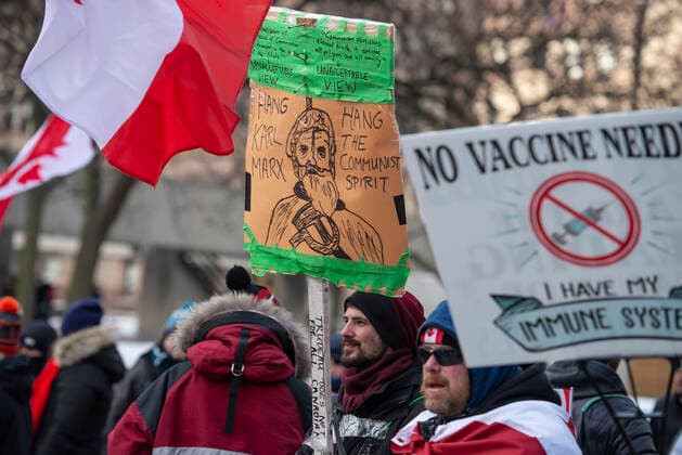 February 12, 2022, Toronto, Ontario, Canada: Protesters gather on the streets on Toronto for a second week in opposition of COVID-19 measures and vaccine mandates imposed by the Justin Trudeau government. Organized by the Ã¢â‚¬oeFreedom ConvoyÃ¢â‚¬Â, the demonstration began with a cross-country trek opposing the federal governmentÃ¢â‚¬â ¢s vaccine mandate for cross-border truckers. Toronto Canada - ZUMAc232 20220212_zip_c232_014 Copyright: xGilesxCampbellx