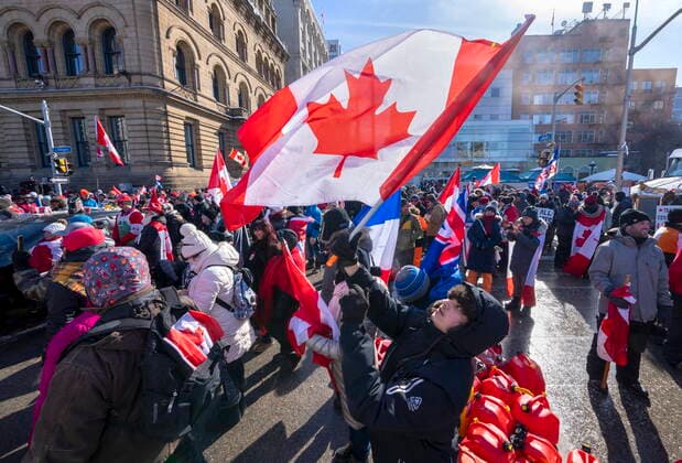 February 13, 2022, Ottawa, on, Canada: People gather for an anti-mandate protest on Parliament Hill in Ottawa on Sunday, February 13, 2022. Ottawa Canada  - ZUMAc35_ 20220213_zaf_c35_088 Copyright: xFrankxGunnx