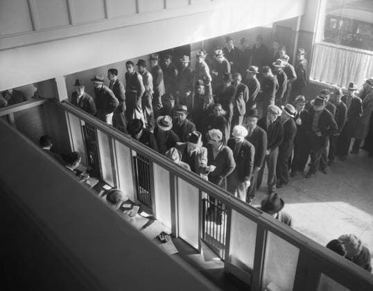 High Angle View of group of men lined up to register for Unemployment Benefits at State Employment Service office, San Francisco, California, USA, Dorothea Lange, U.S. Office of War Information U.S. Farm Security Administration, January 1938  Copyright: xCircaxImagesx ghi-circa10692