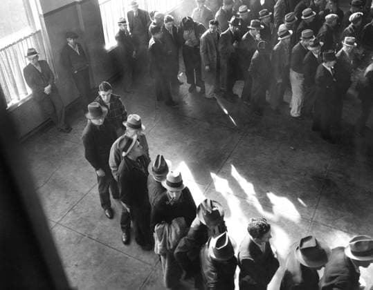 High Angle View of group of men lined up to register for Unemployment Benefits at State Employment Service office, San Francisco, California, USA, Dorothea Lange, U.S. Office of War Information U.S. Farm Security Administration, January 1938  Copyright: xCircaxImagesx ghi-circa10705