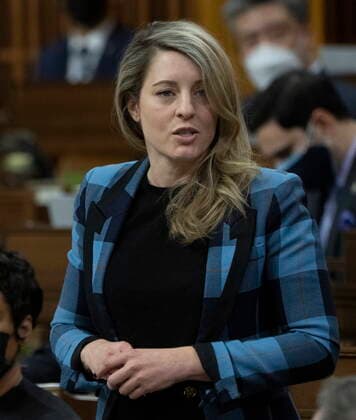 February 14, 2022, Ottawa, ON, Canada: Foreign Affairs Minister Melanie Joly rises during Question Period, Monday, February 14, 2022 in Ottawa. Ottawa Canada  - ZUMAc35_ 20220214_zaf_c35_144 Copyright: xAdrianxWyldx