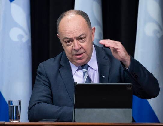 February 15, 2022, QUEBEC, PQ, Canada: Quebec Health Minister Christian Dube, right, confirms a relaxation of rules on vaccination pass, during a news conference on the COVID-19 pandemic, Tuesday, February 15, 2022 at the legislature in Quebec City. Luc Boileau, QUEBEC Canada  - ZUMAc35_ 20220215_zaf_c35_146 Copyright: xJacquesxBoissinotx