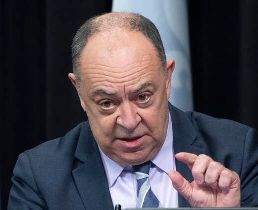 February 15, 2022, QUEBEC, PQ, Canada: Quebec Health Minister Christian Dube, right, confirms a relaxation of rules on vaccination pass, during a news conference on the COVID-19 pandemic, Tuesday, February 15, 2022 at the legislature in Quebec City. Luc Boileau, QUEBEC Canada  - ZUMAc35_ 20220215_zaf_c35_147 Copyright: xJacquesxBoissinotx