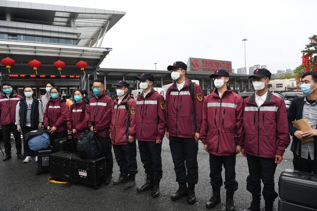 (220217) -- SHENZHEN, Feb. 17, 2022 -- A panel of epidemiology experts gather before setting out to Hong Kong for assistance in COVID-19 fight, in Shenzhen, south China s Guangdong Province, Feb. 17, 2022. China s National Health Commission (NHC) said in a statement on the website that it has been paying close attention to the fifth wave of the COVID-19 pandemic in Hong Kong. A panel of epidemiology experts were sent from Guangdong Province to Hong Kong on Thursday, along with two mobile COVID-19 test vehicles, read the statement. ) CHINA-GUANGDONG-HONG KONG-COVID-19-EPIDEMIOLOGY EXPERTS (CN) LiangxXu 