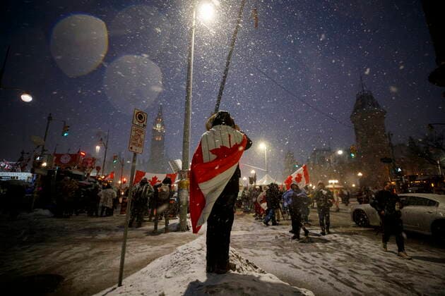 February 17, 2022, OTTAWA, ON, CANADA: Protestors and supporters gather during a protest against COVID-19 measures that has grown into a broader anti-government protest continues to occupy downtown Ottawa on Thursday, Feb. 17, 2022. OTTAWA CANADA  - ZUMAc35_ 20220217_zaf_c35_176 Copyright: xColexBurstonx