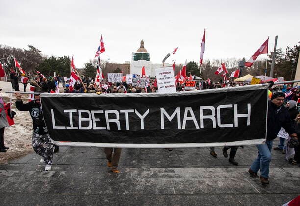 February 19, 2022, EDMONTON, AB, CANADA: Demonstrators gather to protest against COVID-19 measures and in support of a demonstration in Ottawa which has grown to a broader anti-government demonstration, in Edmonton, Saturday, Feb. 19, 2022. EDMONTON CANADA  - ZUMAc35_ 20220219_zaf_c35_128 Copyright: xJasonxFransonx