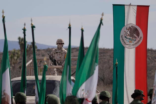 109th Anniversary Of The Mexican Army A member of the army aboard a van during the commemoration of the 109th Anniversary of the Mexican Army in Ramos Arizpe, Coahuila. The past that shaped this armed force and laid the foundations for what it is today dates back to the Mexican Revolution, with the enactment of Decree 1421 on 19 February 1913, issued by the XXII Congress of the State of Coahuila, by which the government of Victoriano Huerta was disowned, empowering Governor Venustiano Carranza to arm forces and restore constitutional order. Ramos Arizpe Coahuila Ramos Arizpe Coahuila Mexico  Copyright: xGerardoxVieyrax originalFilename: vieyra-notitle220219_npWxb.jpg