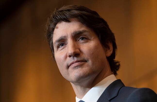 February 21, 2022, Ottawa, ON, Canada: Prime Minister Justin Trudeau listens to a question a news conference, Monday, February 21, 2022 in Ottawa. Ottawa Canada  - ZUMAc35_ 20220221_zaf_c35_020 Copyright: xAdrianxWyldx