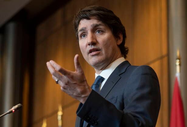 February 21, 2022, Ottawa, ON, Canada: Canadian Prime Minister Justin Trudeau responds to a question during a news conference, Monday, February 21, 2022 in Ottawa. Ottawa Canada  - ZUMAc35_ 20220221_zaf_c35_024 Copyright: xAdrianxWyldx