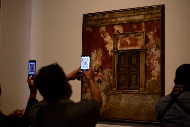 Exhibition To Celebrate 50 Years of Rafael Cauduro s Artistic Career MEXICO CITY, MEXICO - FEB 22, 2022: A person takes a photo during a tour of the exhibition A Cauduro is a Cauduro to celebrate 50 years of artistic career of Rafael Cauduro at Colegio de San Ildefonso. On February 22, 2022 in Mexico City, Mexico. (Photo by Carlos Tischler Eyepix Group) Copyright: xCarlosxTischlerx xEyepixxGroupx EYEPIX_CT_22022022_56608