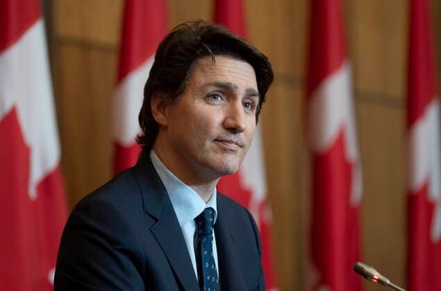 February 23, 2022, Ottawa, ON, Canada: Canadian Prime Minister Justin Trudeau listens to a question during a news conference, Wednesday, February 23, 2022 in Ottawa. Ottawa Canada  - ZUMAc35_ 20220223_zaf_c35_039 Copyright: xAdrianxWyldx
