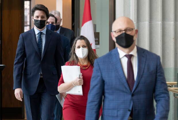 February 23, 2022, Ottawa, ON, Canada: Minister of Justice and Attorney General of Canada David Lametti, Deputy Prime Minister and Finance Minister Chrystia Freeland , Prime Minister Justin Trudeau, Public Safety Minister Marco Mendicino and President of the QueenöÄÃ s Privy Council for Canada and Emergency Preparedness Minister Bill Blair make their way to a news conference, Wednesday, February 23, 2022 in Ottawa. Ottawa Canada  - ZUMAc35_ 20220223_zaf_c35_047 Copyright: xAdrianxWyldx