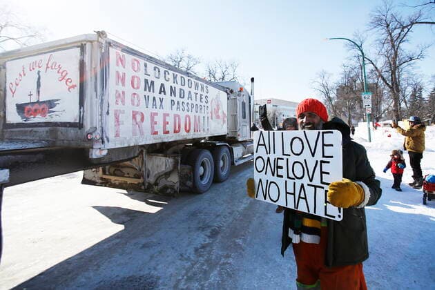 February 23, 2022, WINNIPEG, MANITOBA, CANADA: A small group of COVID-19 mandate protesters remain on the street as a convoy forms and they head home Wednesday, February 23, 2022. The group received a notice from the Winnipeg Police that they have a deadline of 5pm Wednesday to move off the street and unblock Memorial Blvd. The group plans to depart peacefully and set up a camp in a nearby park. WINNIPEG CANADA  - ZUMAc35_ 20220223_zaf_c35_064 Copyright: xJohnxWoodsx