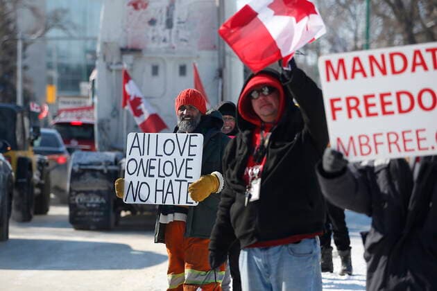 February 23, 2022, WINNIPEG, MANITOBA, CANADA: A small group of COVID-19 mandate protesters remain on the street as a convoy forms and heads home, Wednesday, February 23, 2022. The group received a notice from the Winnipeg Police that they have a deadline of 5pm Wednesday to move off the street and unblock Memorial Blvd. The group plans to depart peacefully and set up a camp in a nearby park. WINNIPEG CANADA  - ZUMAc35_ 20220223_zaf_c35_067 Copyright: xJohnxWoodsx